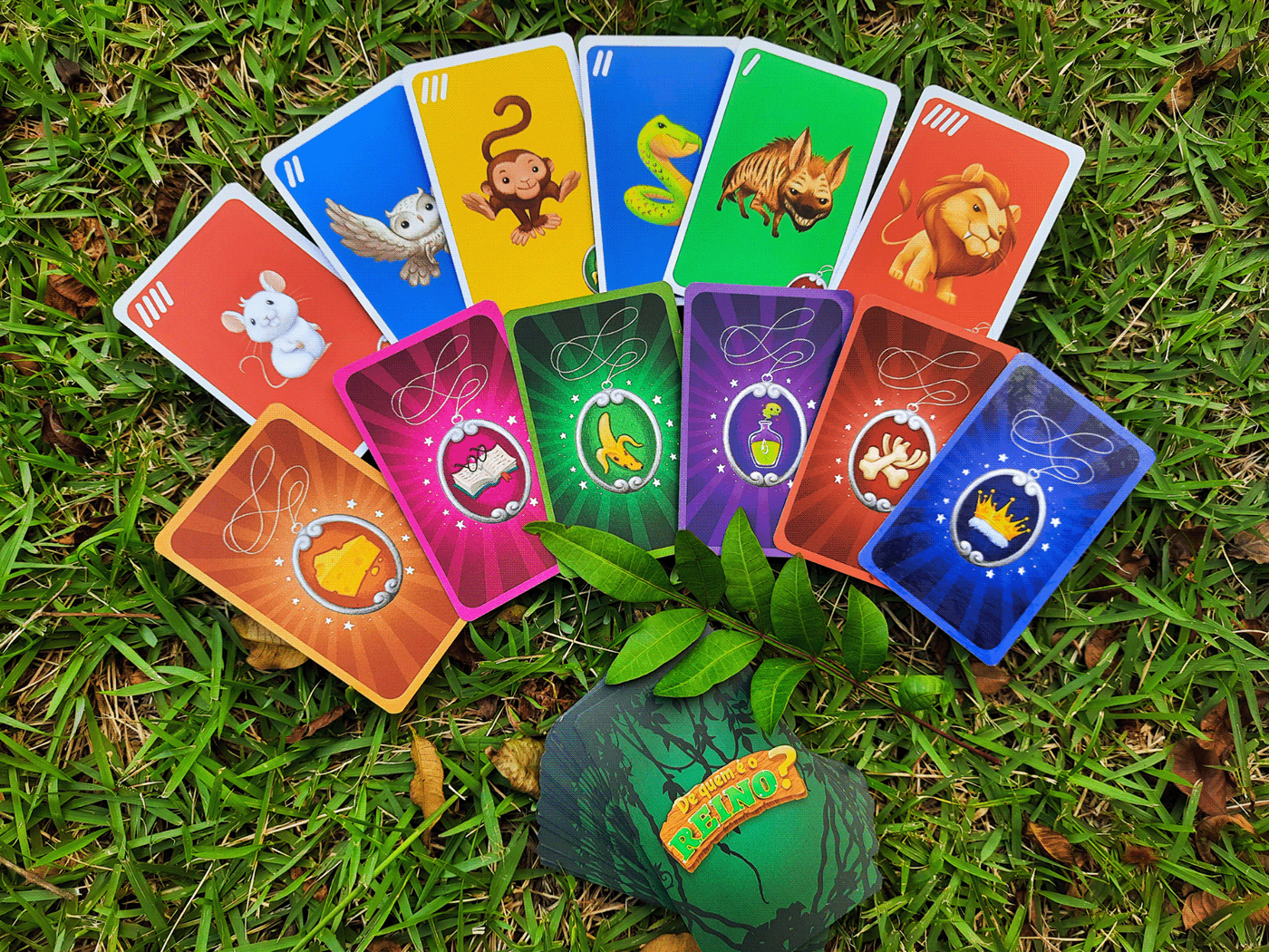Photo of the cards of animals and amulets scattered on the grass