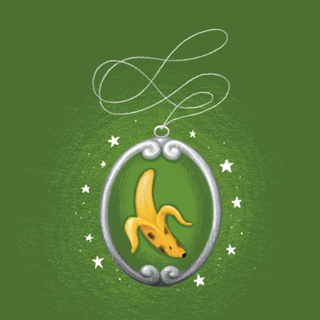 Magic amulet of a banana in a green background
